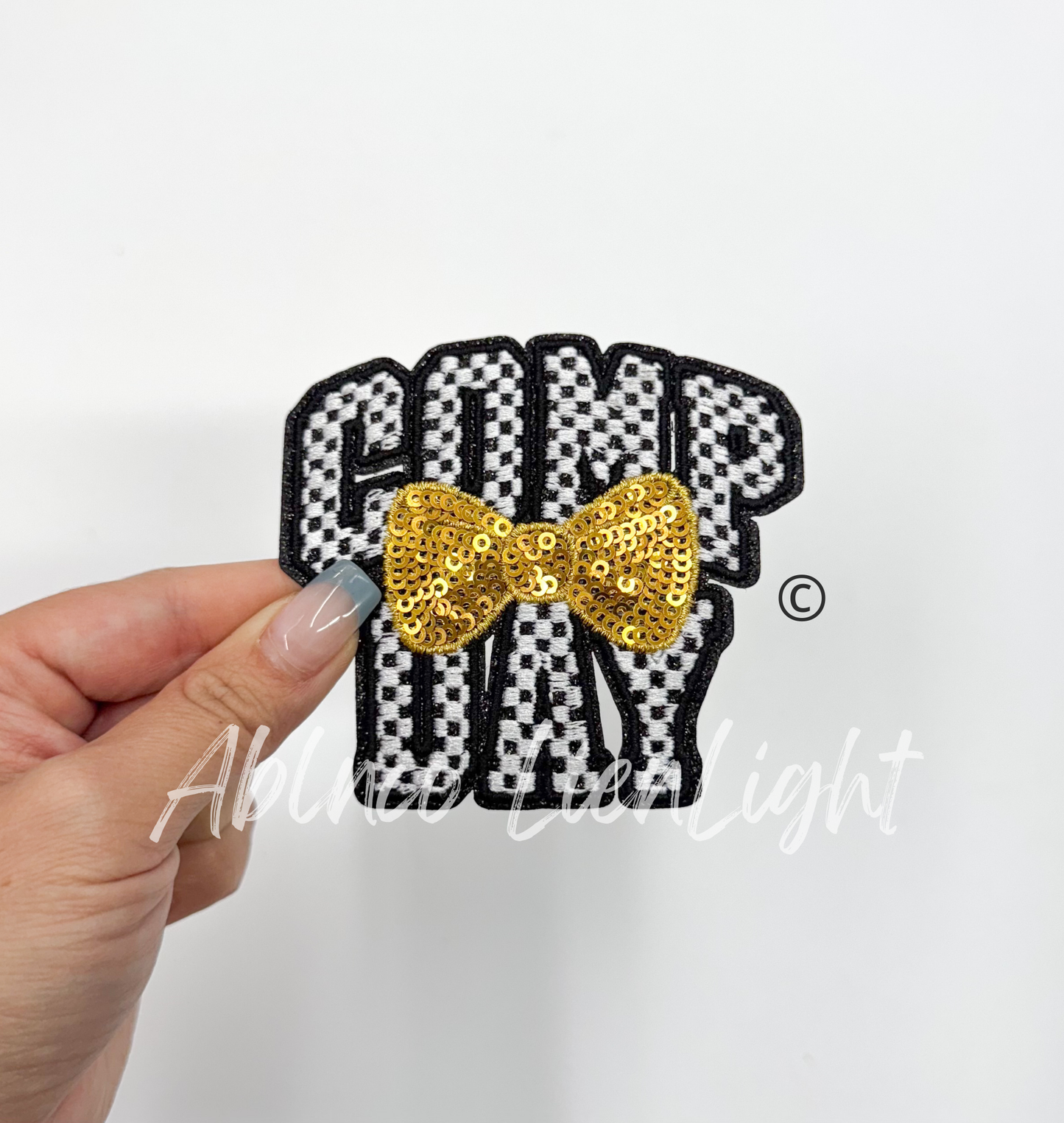 Checkered Comp Day Sequins Gold Bow Embroidery Patch ©️